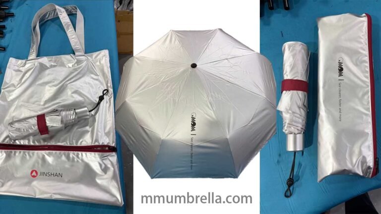 Private label umbrella collection concept with brand-coloured umbrellas, hang tags, sleeves and retail packaging